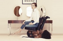 Magazine-feature-photo-of-a-white-woman-sitting-on-a-black-woman-mannequin-chair-disgrace-to-the-industry